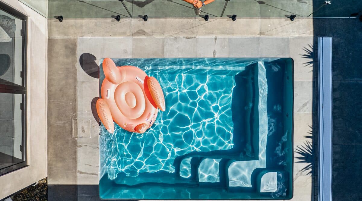 Aerial view of a Kiwi Dream 4 pool showing its corner steps and bench