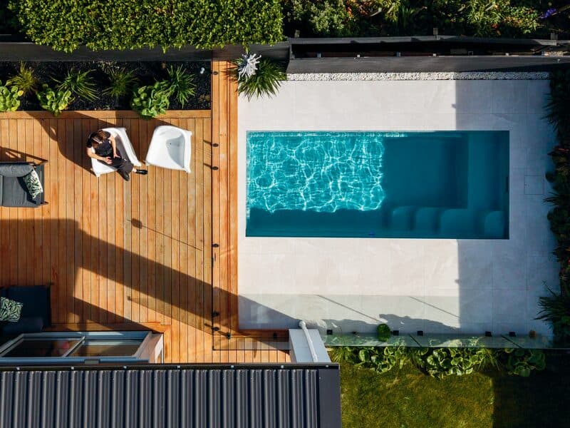 Aerial view of a Kiwi Urban 5 plunge pool beside a timber deck